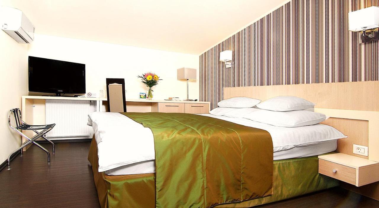 Hotel Trianon Bucureşti Cameră foto